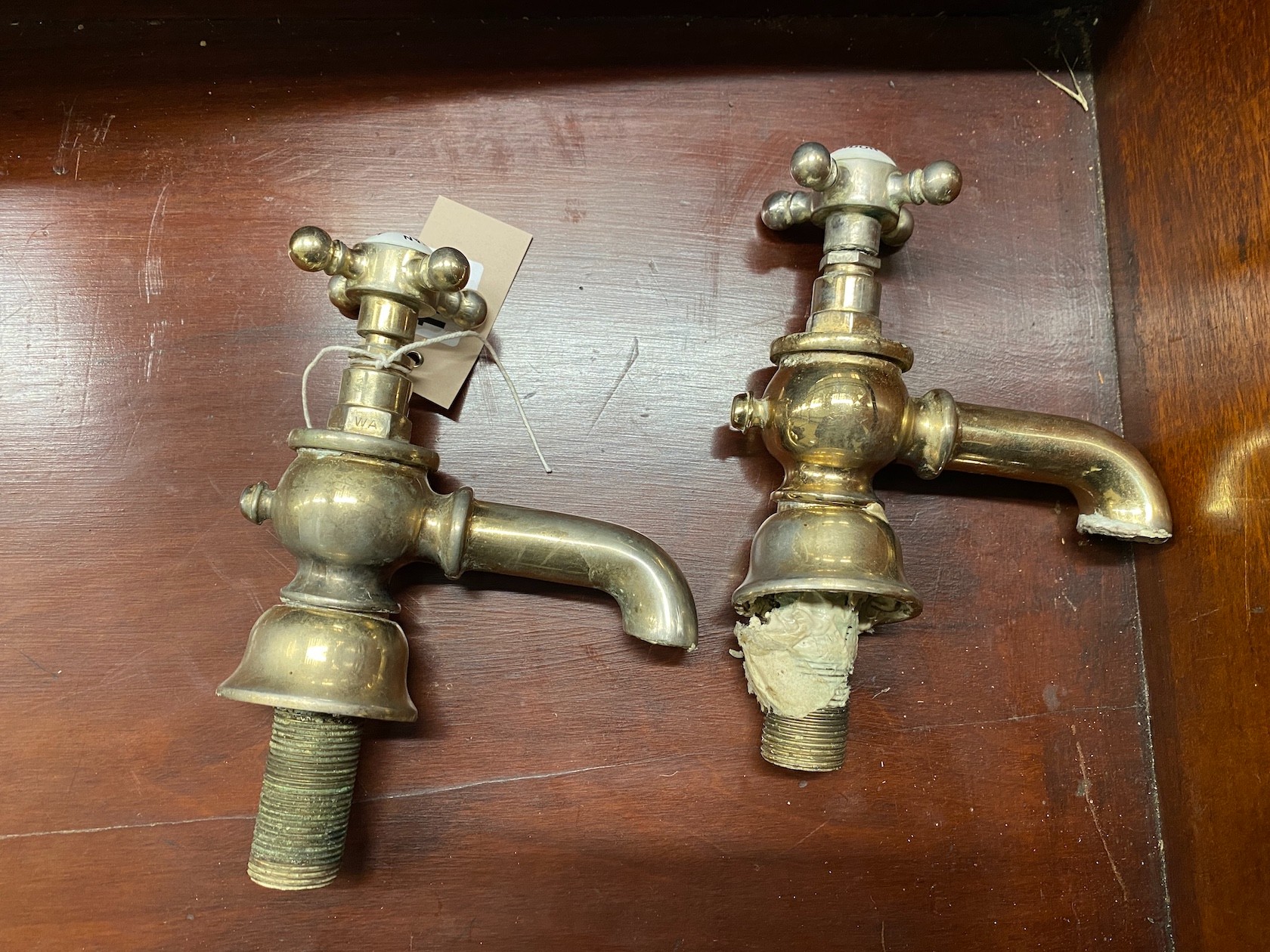 A pair of Sanitan taps, height 14cm